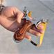 Metal slingshot with wooden grips