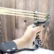 Fishing slingshot with a wrist brace
